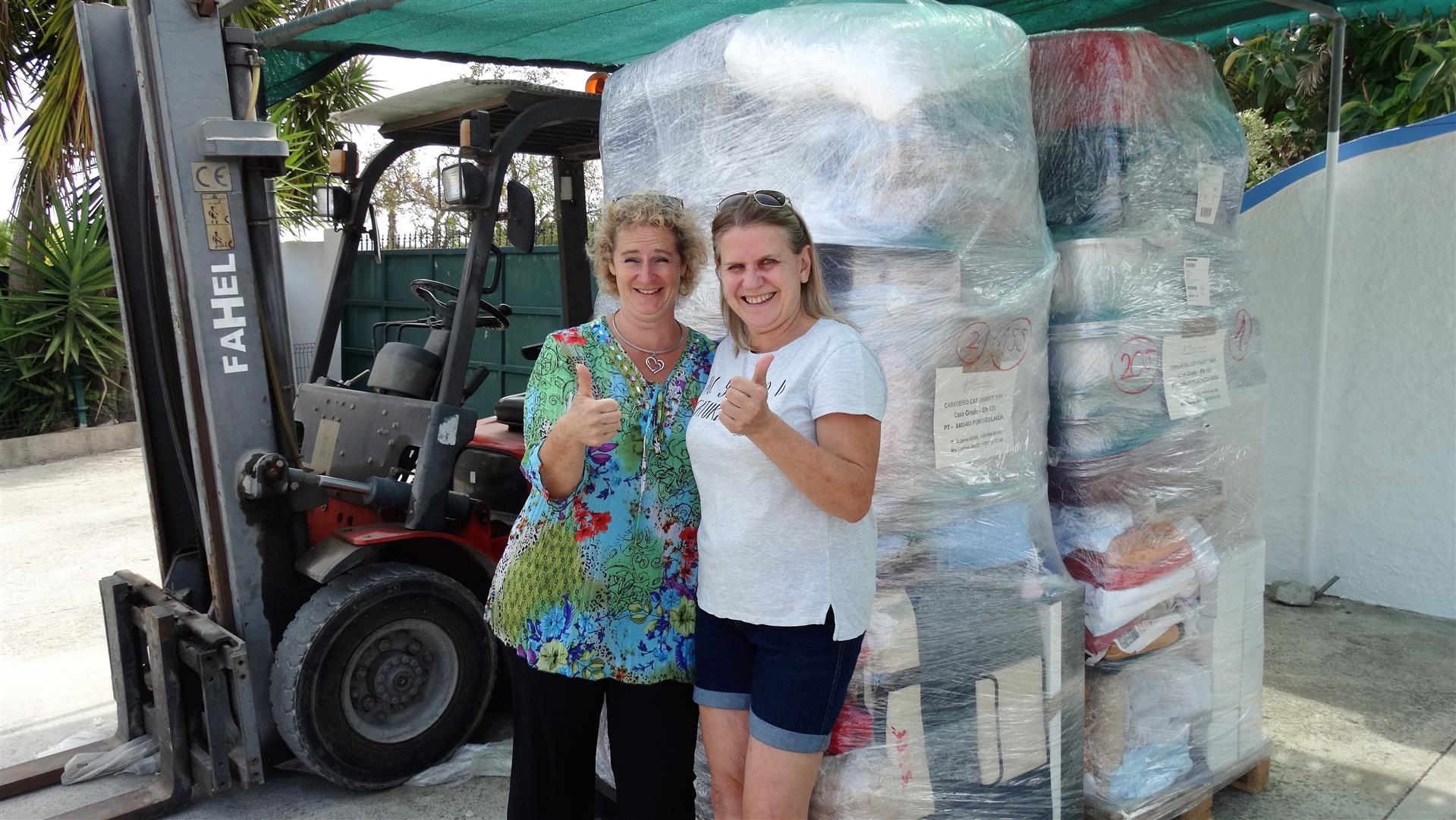 Two pallets of material donations for Carvoeiro Cat Charity